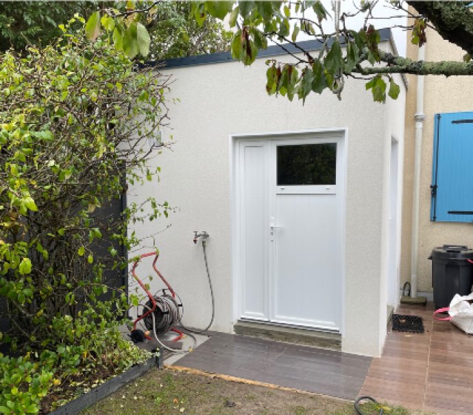 Annexe de jardin en béton enduit Toit Terrasse